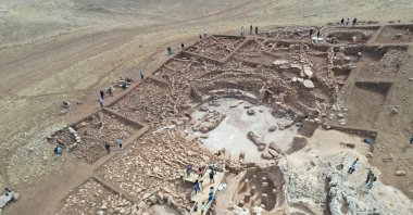 An aerial view of the Göbeklitepe site dating back to about 12,000 years to the Neolithic Age, Şanliurfa, Türkiye, Jan. 1, 2023. (IHA Photo)