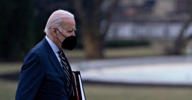 U.S. President Joe Biden walks on the South Lawn of the White House following an arrival on Marine One after accompanying First Lady Jill Biden to Walter Reed National Military Medical Center in Washington, D.C., on Jan. 11, 2023. 