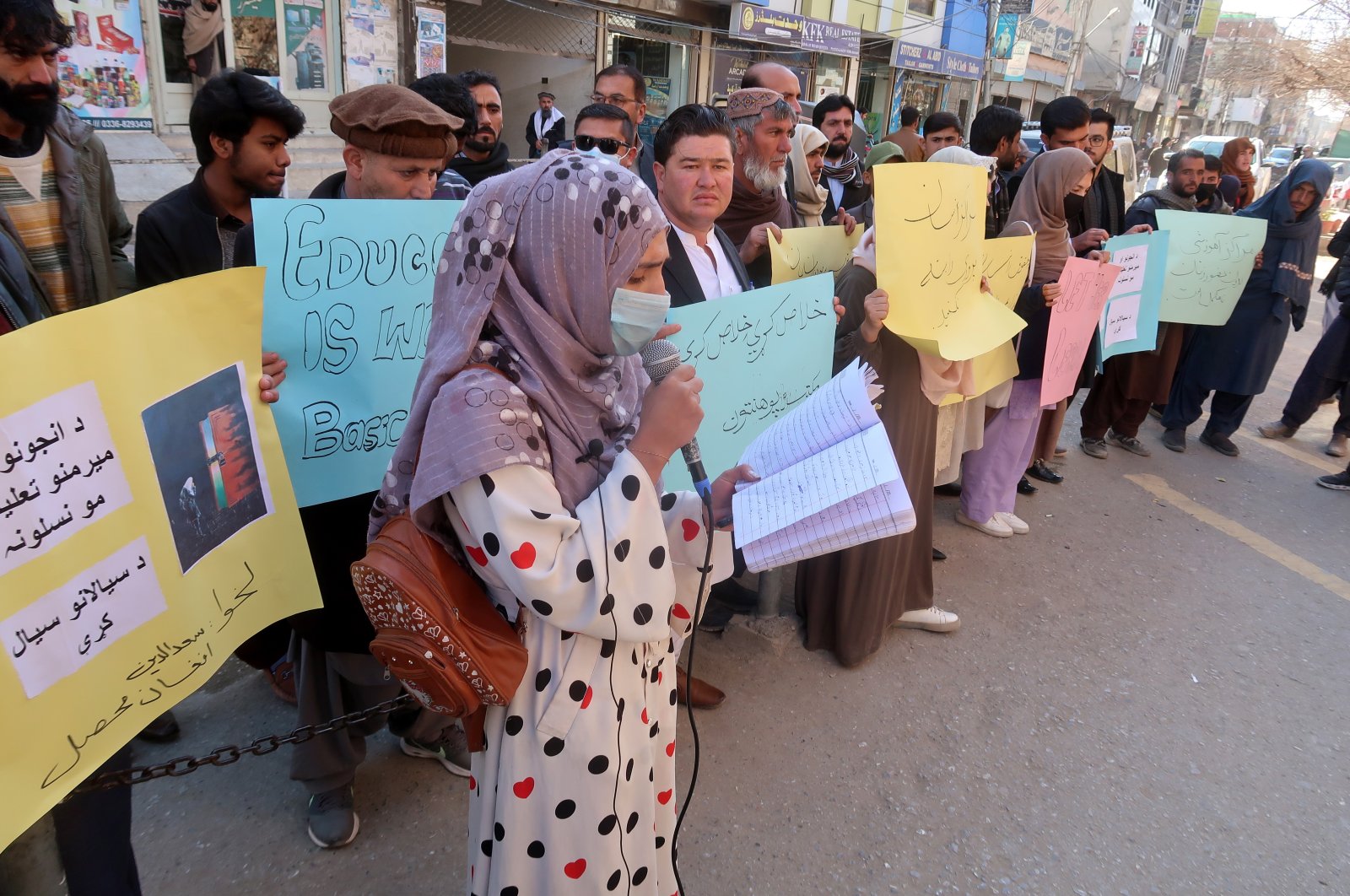 Afghan refugees in Pakistan hold placards during a protest as they demand the Taliban government to allow education for girls, in Quetta, the provincial capital of Balochistan province, Pakistan, Dec. 24, 2022. (EPA Photo)