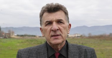 Burhan Baran, a deputy with the leftist opposition PASOK party in Greece, speaks to Anadolu Agency (AA) in the Horozlu (Petinos) town of Western Thrace bordering Türkiye, Jan. 11, 2023. (AA Photo)