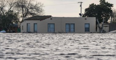 A house is submerged in floodwaters from the Salinas River near Chualar, California, U.S., Jan. 12, 2023. (AFP Photo)