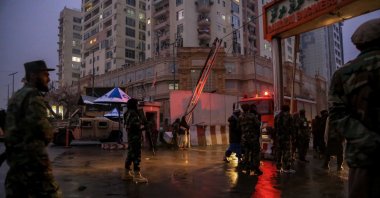 Taliban stand guard at the scene of a bomb blast outside the Afghan Foreign Ministry, Kabul, Afghanistan, Jan. 11, 2023. (EPA Photo)
