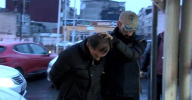 Hazni Gölge, a suspect involved in the Nov. 13 terrorist attack on Istanbul’s Istiklal Street, is accompanied by a police officer to court in Istanbul, Türkiye, Jan. 13, 2023. (DHA Photo)