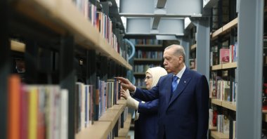 President Recep Tayyip Erdoğan and his wife first lady Emine Erdoğan check books at the newly inaugurated Rami Library in Istanbul, Friday, Jan. 13, 2023. (AA Photo)