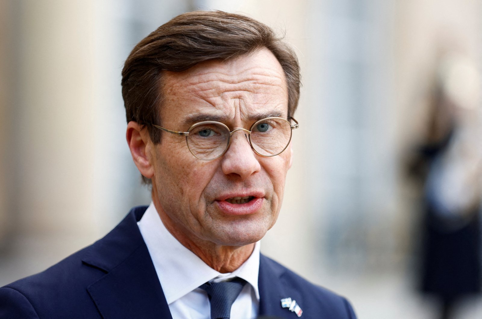 Swedish Prime Minister Ulf Kristersson speaks during a joint statement with French President Emmanuel Macron before a meeting at the Elysee Palace in Paris, France, Jan. 3, 2023. (Reuters File Photo)