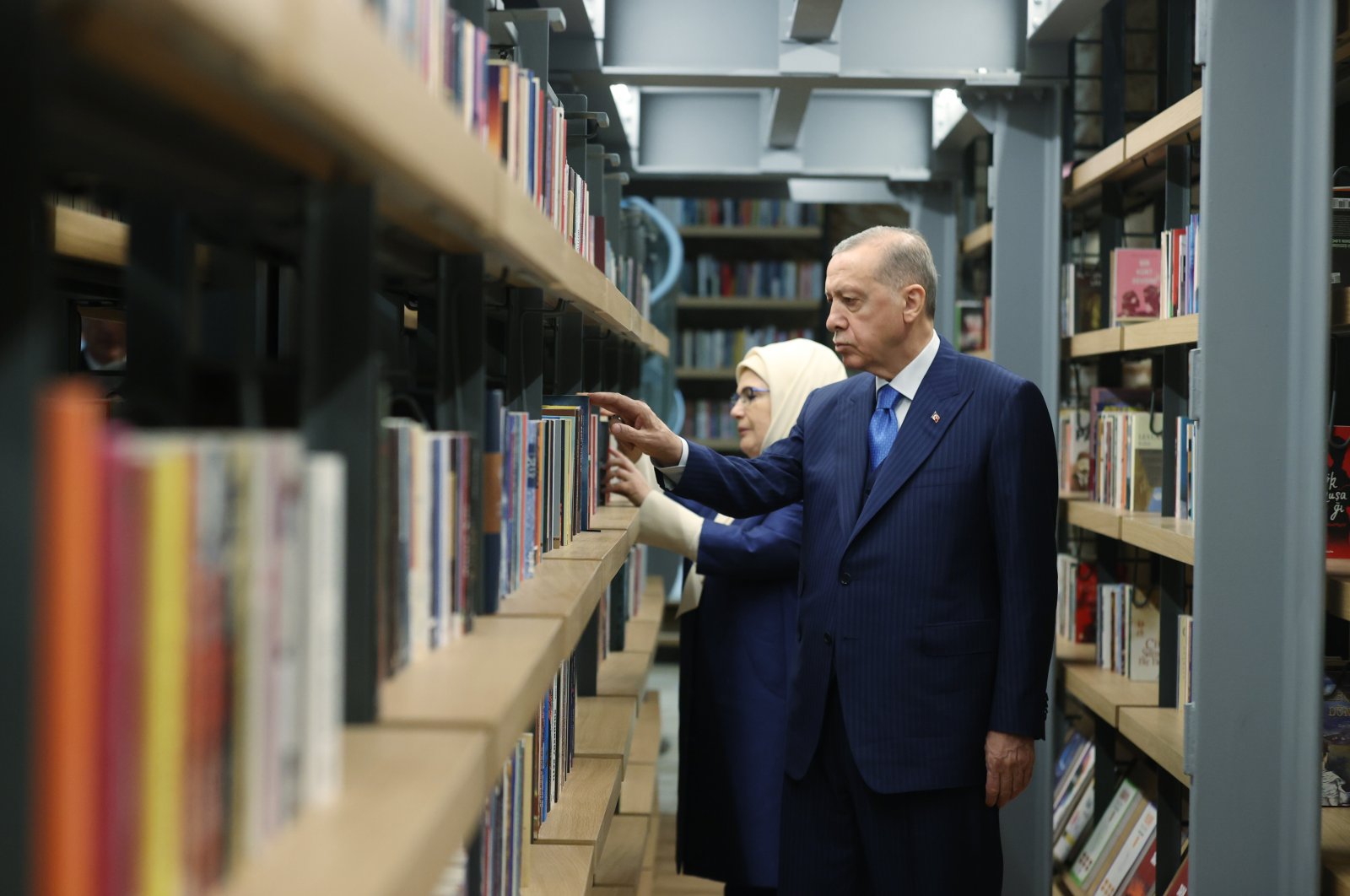 President Recep Tayyip Erdoğan and his wife first lady Emine Erdoğan check books at the newly inaugurated Rami Library in Istanbul, Friday, Jan. 13, 2023. (AA Photo)