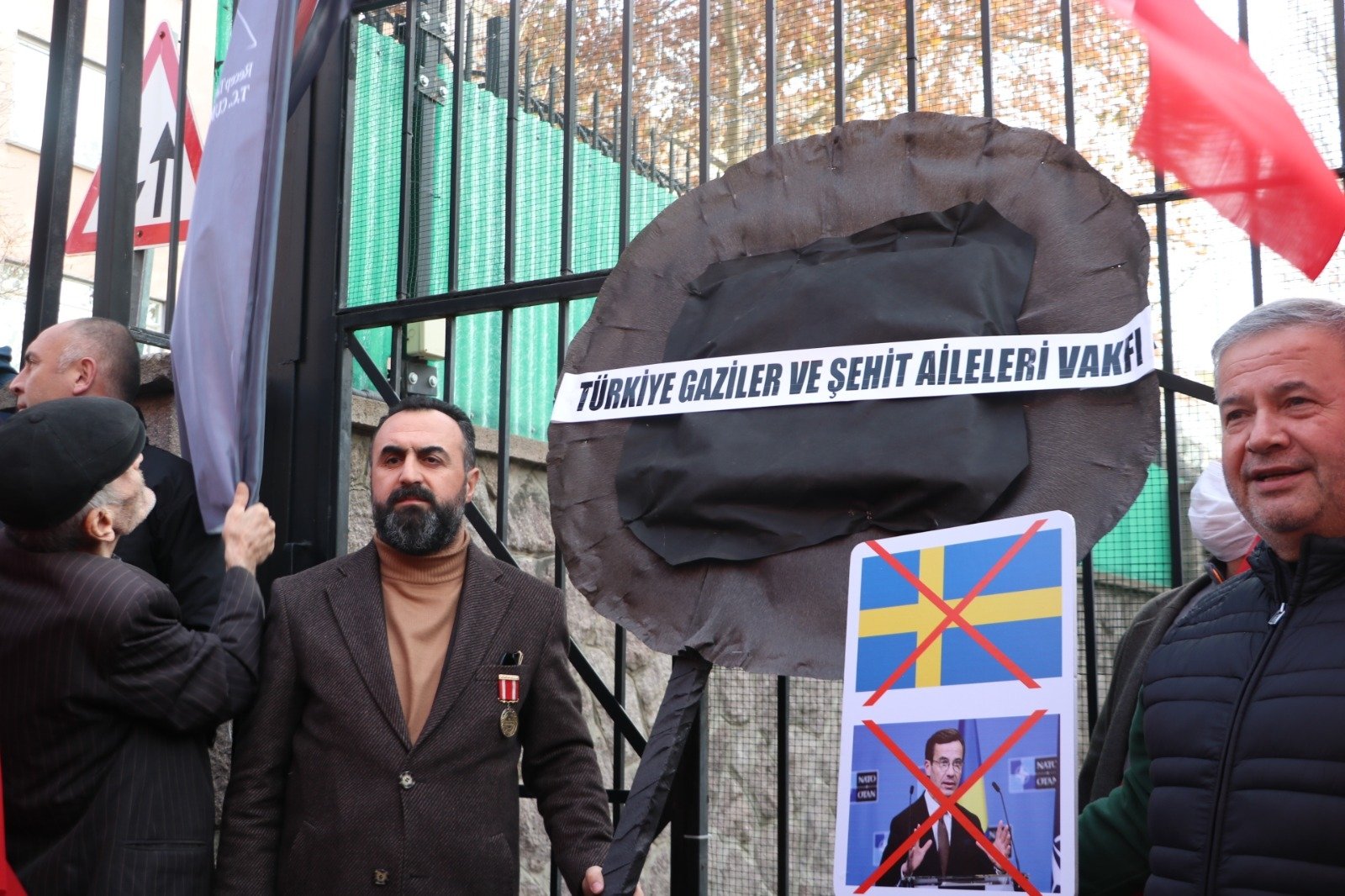 An association of counterterrorism veterans and families of fallen soldiers lay a black wreath at the Swedish Embassy in the capital Ankara, Türkiye, Jan. 13, 2023. (DHA Photo)
