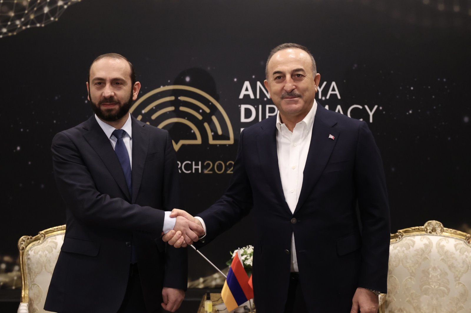 Foreign Minister Mevlüt Çavuşoğlu (R) meets with his Armenian counterpart Ararat Mirzoyan (L), in Antalya, southern Türkiye, March 12, 2022. (Getty Photo)