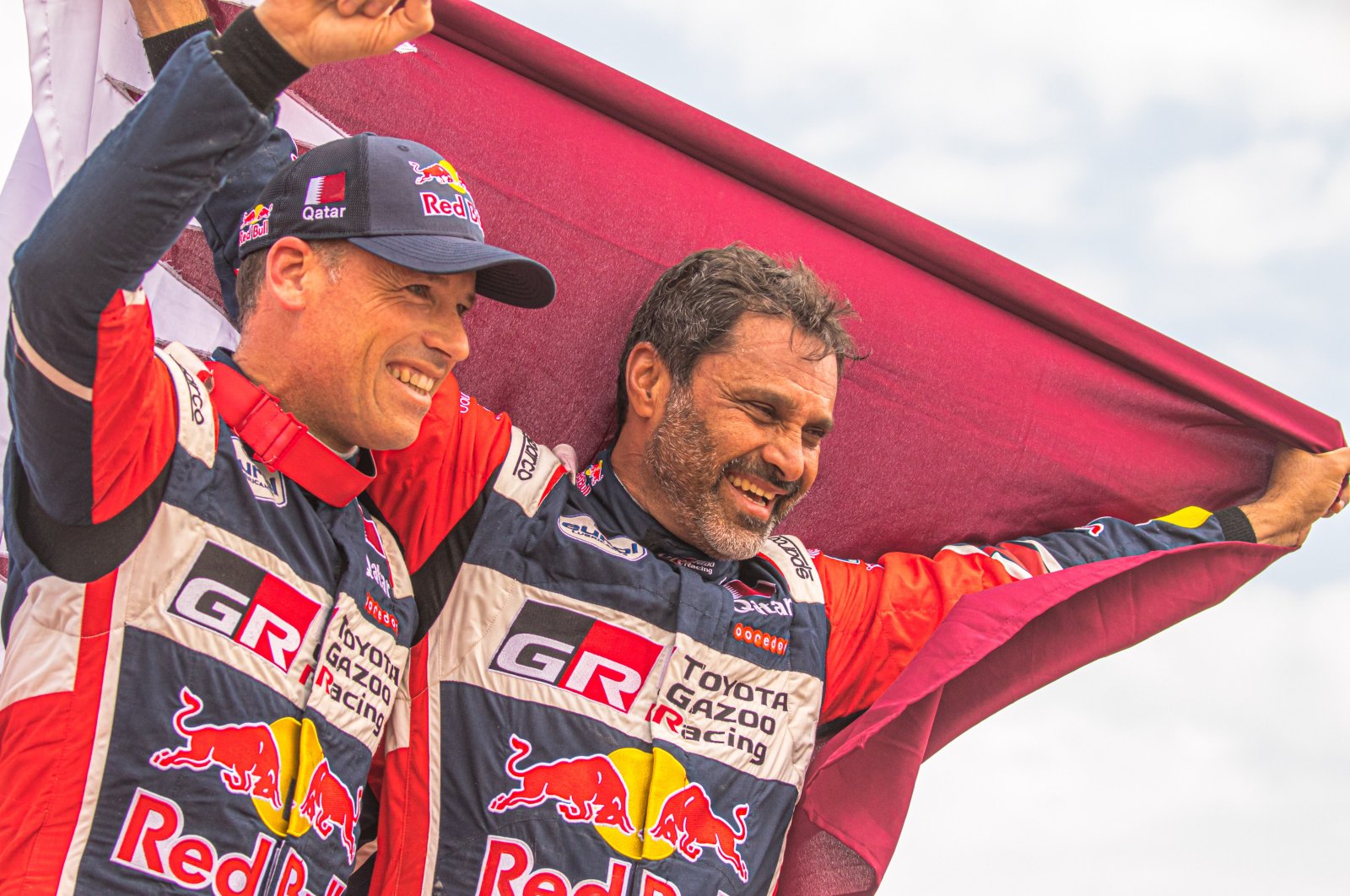 Qatari driver Nasser Al-Attiyah (R) and French co-driver Mathieu Baumel of Toyota Gazoo Racing after winning the Dakar Rally 2023, Dammam, Saudi Arabia, Jan. 15, 2023. (EPA Photo)