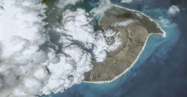 Satellite image shows ash plume rising from Hunga Tonga-Hunga Ha&#039;apai underwater volcano, in Tonga, Dec. 24, 2021. (Getty Images Photo)