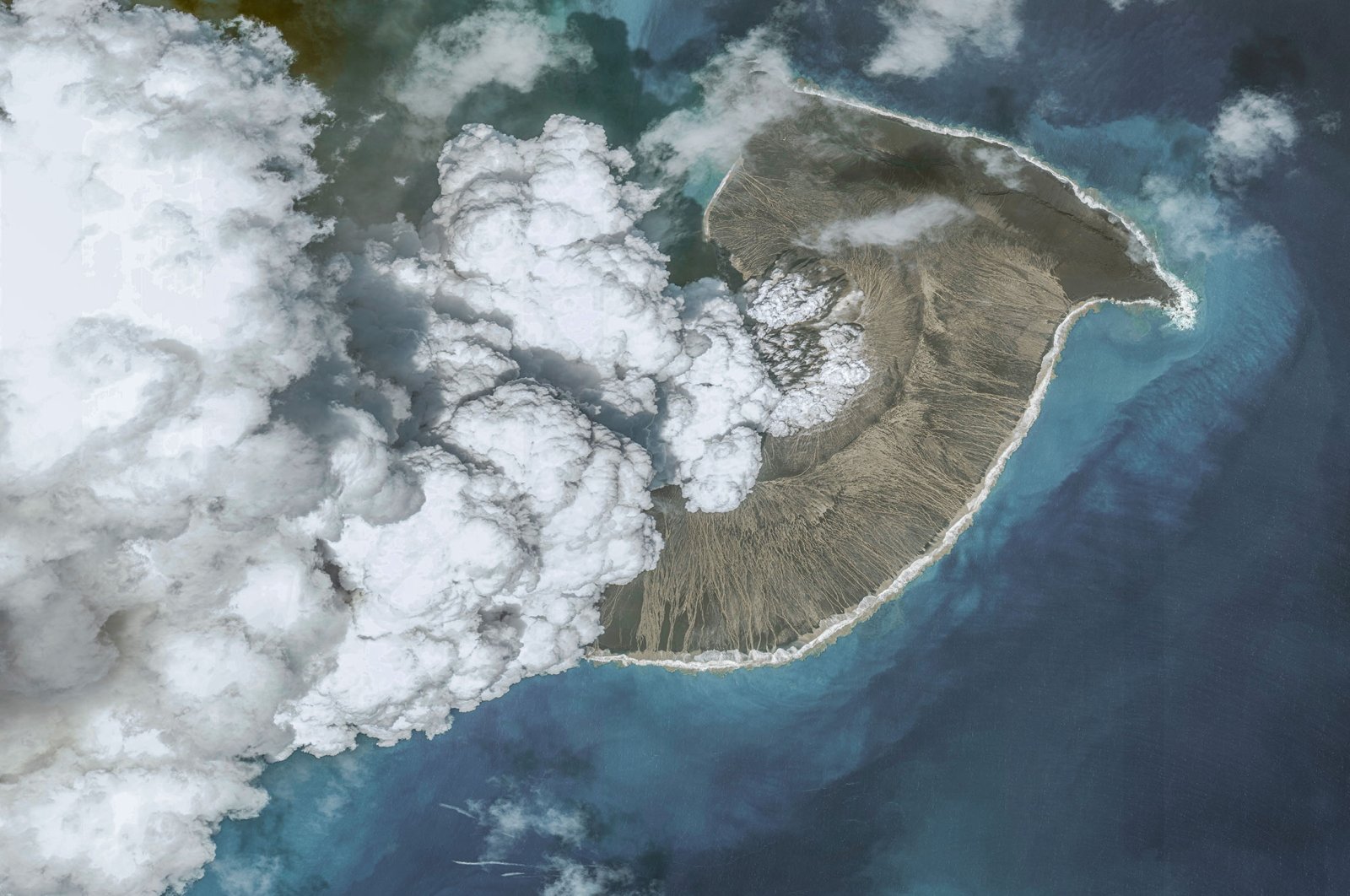 Satellite image shows ash plume rising from Hunga Tonga-Hunga Ha&#039;apai underwater volcano, in Tonga, Dec. 24, 2021. (Getty Images Photo)