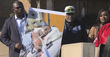 Tyre Nichols' stepfather Rodney Wells (C) stands next to a photo of Nichols in the hospital after his arrest, during a protest in Memphis, Tennesse, U.S., Jan. 14, 2023. (AP Photo)