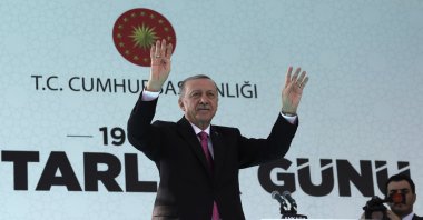 President Recep Tayyip Erdoğan salutes supporters at an inauguration ceremony of new government buildings in Ankara, Türkiye, Oct. 19, 2022. (AP Photo)