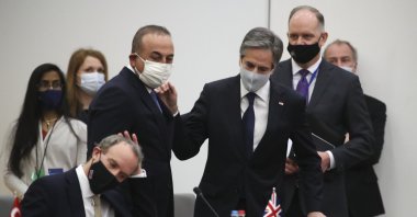 U.S. Secretary of State Antony Blinken (R) talks to Foreign Minister Mevlüt Çavuşoğlu (C) during a NATO meeting, in Brussels, Belgium, March 23, 2021. (AP Photo)