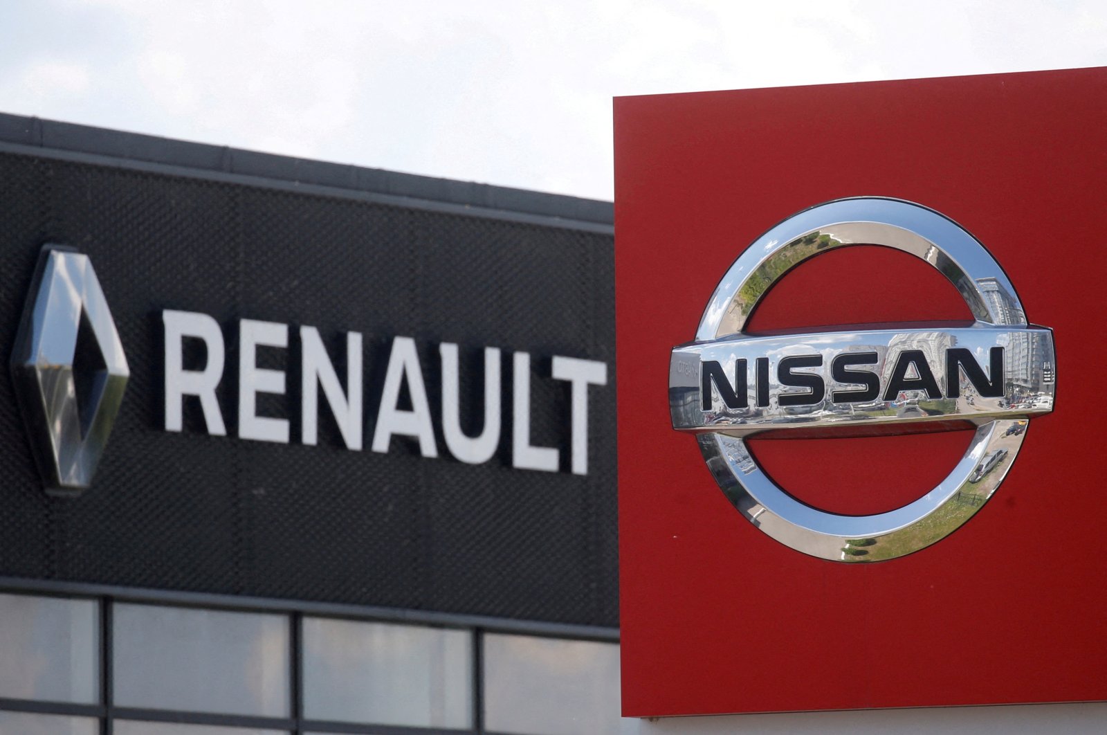 The logos of car manufacturers Nissan and Renault at a dealership in Kyiv, Ukraine, June 25, 2020. (Reuters Photo)