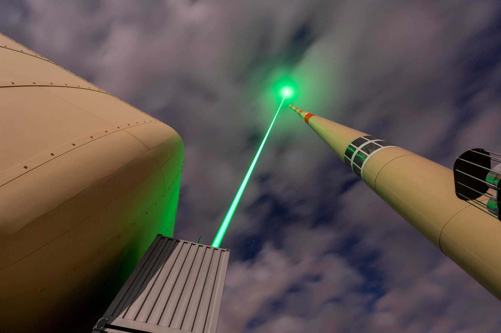 The Laser Lightning Rod, an experimental lighting protection device that diverts the path of lightning bolts using a high-power laser, at the top of Mount Santis, Switzerland, Jan. 16, 2023. (Reuters Photo)