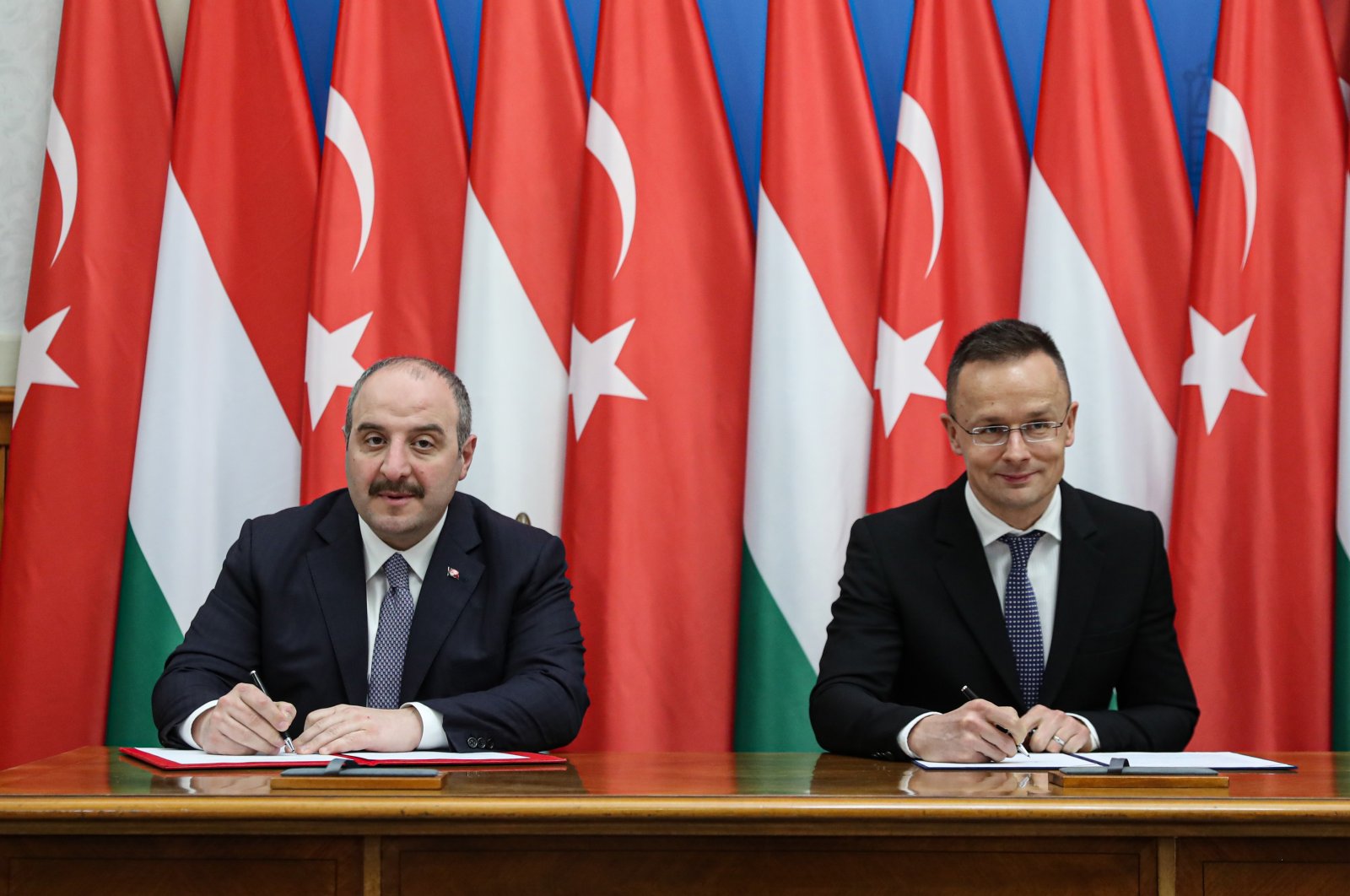 Industry and Technology Minister Mustafa Varank (L) and Hungarian Foreign and Trade Minister Peter Szijjarto attend a joint news conference, Budapest, Hungary, Jan. 16, 2023. (Courtesy of Industry and Technology Ministry)