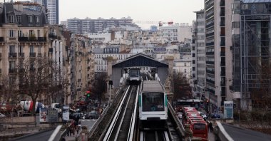 A subway operated by the Paris transport network RATP makes its way on an elevated metro line in Paris on the eve of a nationwide day of strike and protests in key sectors like energy, public transport, air travel and schools against the pension reform in France, Jan. 18, 2023.  (Reuters Photo)