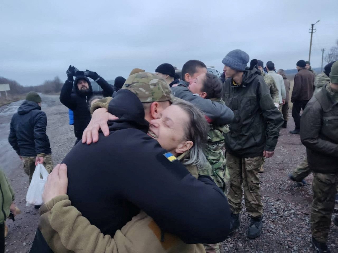 A woman embraces a Ukrainian prisoner of war after a swap, amid Russia&#039;s attack on Ukraine, in an unknown location, Ukraine, Dec. 31, 2022. (Reuters Photo)