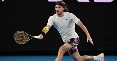 Greece's Stefanos Tsitsipas hits a return against Australia's Rinky Hijikata during their men's singles match on day three of the Australian Open tennis tournament, Melbourne, Australia, Jan. 18, 2023. (AFP Photo)