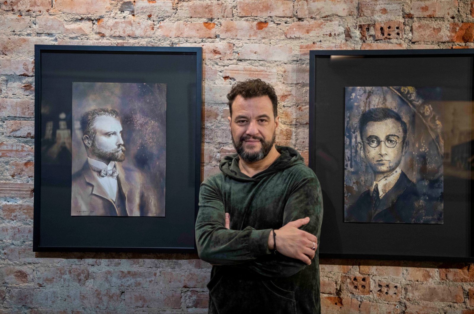 Andreas Georgiadis poses with his artworks, Istanbul, Türkiye, Jan. 17, 2023. (Photo courtesy of Andreas Georgiadis)