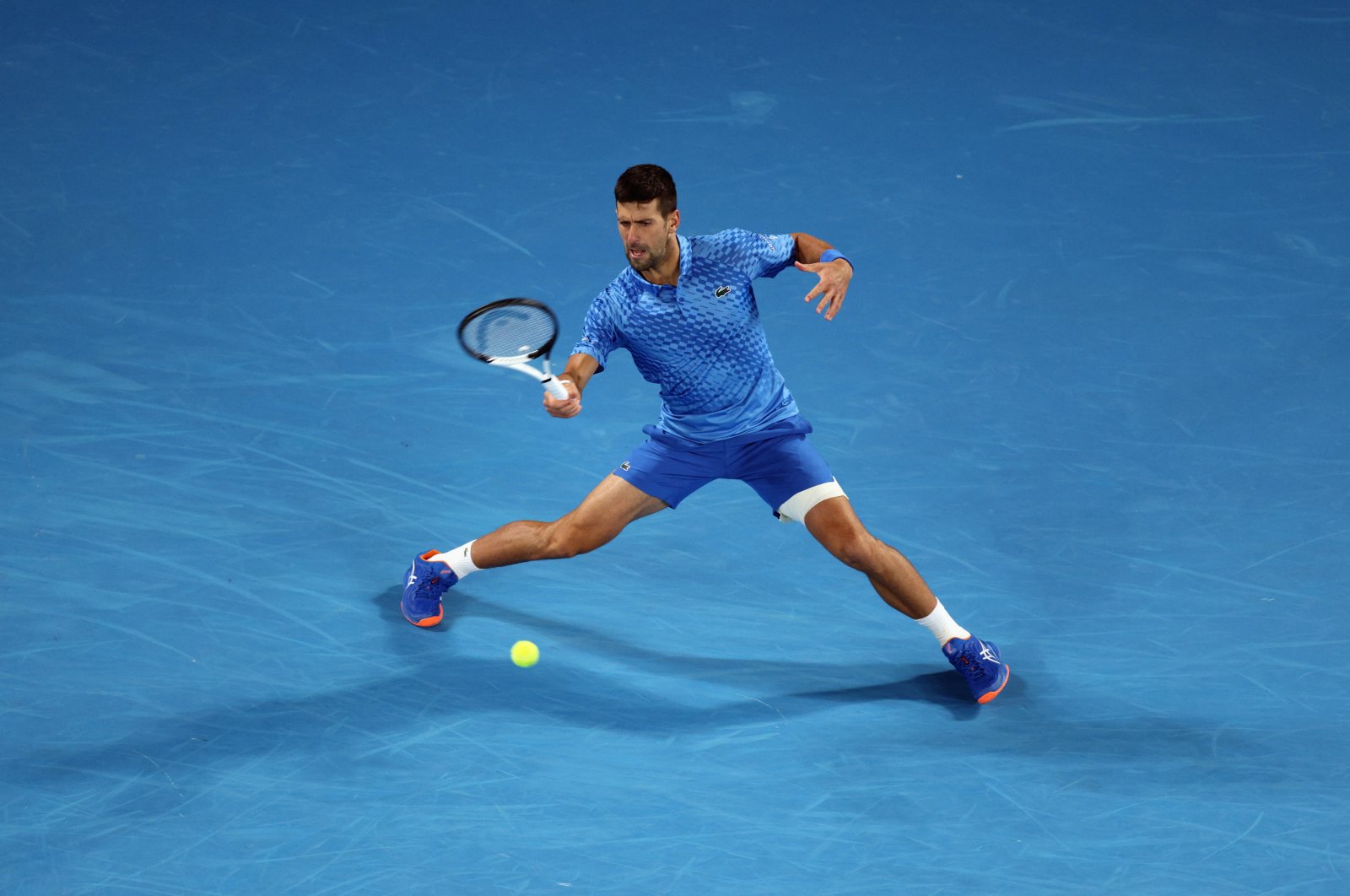 Serbia&#039;s Novak Djokovic in action during his second round match against France&#039;s Enzo Couacaud, Melbourne, Australia, Jan.19, 2023. (Reuters Photo)