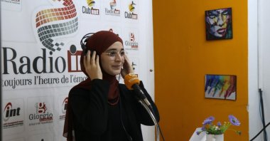 Tunisian radio host Sara Rahuma runs her ''Let's talk in Turkish'' program, Tunis, Tunisia, Jan. 19, 2023. (AA Photo)