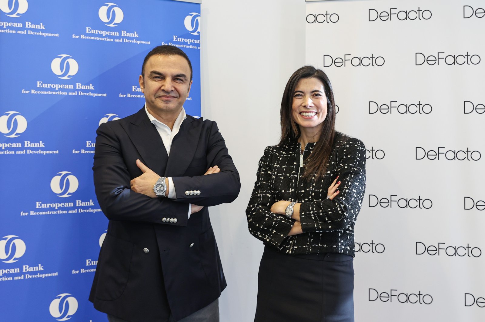 DeFacto CEO Ihsan Ateş (L) and Hande Işlak, EBRD deputy head for Türkiye, are seen at the EBRD office in Istanbul, Türkiye, Jan. 20, 2023. (AA Photo)
