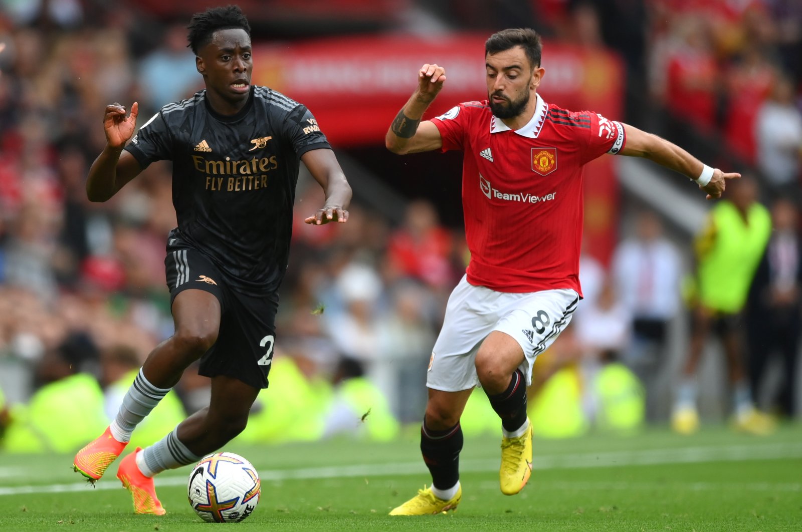 Arsenal&#039;s Albert Sambi Lokonga runs with the ball while under pressure from Manchester United&#039;s Bruno Fernandes during the Premier League match between Manchester United and Arsenal FC at Old Trafford, Manchester, England, Sept. 4, 2022. (Getty Images Photo)