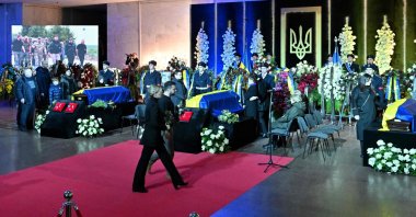 Ukrainian President Volodymyr Zelensky and his wife Olena attend the funeral ceremony of Ukrainian Interior Minister Denys Monastyrsky and other employees of his department at the Ukrainian House in Kyiv, Ukraine, Jan. 21, 2023. (AFP Photo)