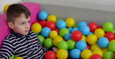 Miran Ceylan, a child with autism, is seen in an educational center for children with special needs in Kocaeli, Türkiye, Jan. 22, 2023. (IHA Photo)