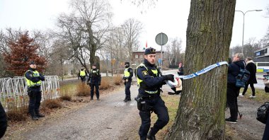 Police cordon off the area where leader of the far-right Danish political party Stram Kurs Rasmus Paludan has planned to burn the Quran outside the Turkish Embassy in Stockholm, Sweden, Jan. 21, 2023. (Reuters Photo)