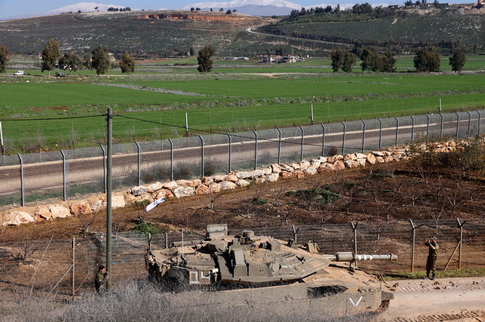 Israeli soldiers gather near the northern Israeli town of Metula on the border with Lebanon, Jan, 19, 2023. (AFP Photo)