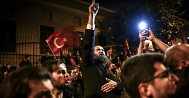 Demonstrators denounce far-right politician Rasmus Paludan after he burned a copy of the Holy Quran in front of the Turkish Embassy in Stockholm during a protest outside the Swedish Consulate-General, Istanbul, Türkiye, Jan. 22, 2023. (EPA Photo) 