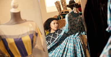South African influencer Masego Morgan poses for a portrait at a Vintage shop in Simon's Town, South Africa, Dec. 15, 2022. (AFP Photo)
