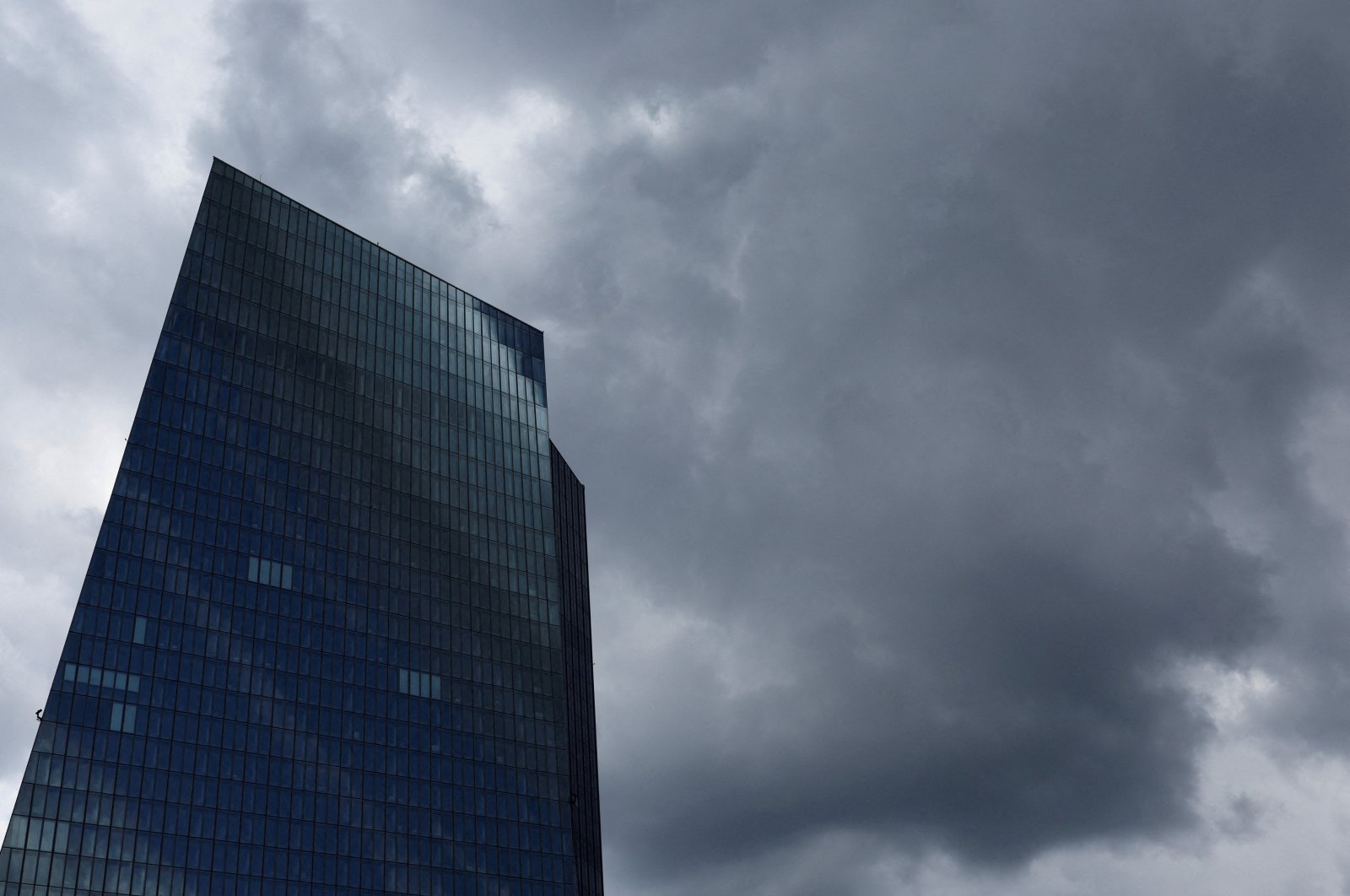 Rain clouds gather near the European Central Bank (ECB) building, in Frankfurt, Germany, July 21, 2022. (Reuters Photo)
