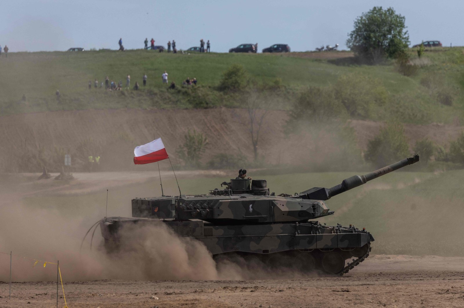 A Polish Leopard tank maneuvers during the DEFENDER-Europe 22 military exercise, Nowogrod, Poland, May 19, 2022. (AFP Photo)