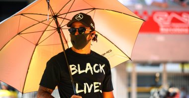 Great Britain's Lewis Hamilton on the grid wearing a 'Black Lives Matter' t-shirt prior to the F1 Grand Prix of Spain at Circuit de Barcelona-Catalunya, Barcelona, Spain, Aug. 16, 2020. (Getty Images Photo)
