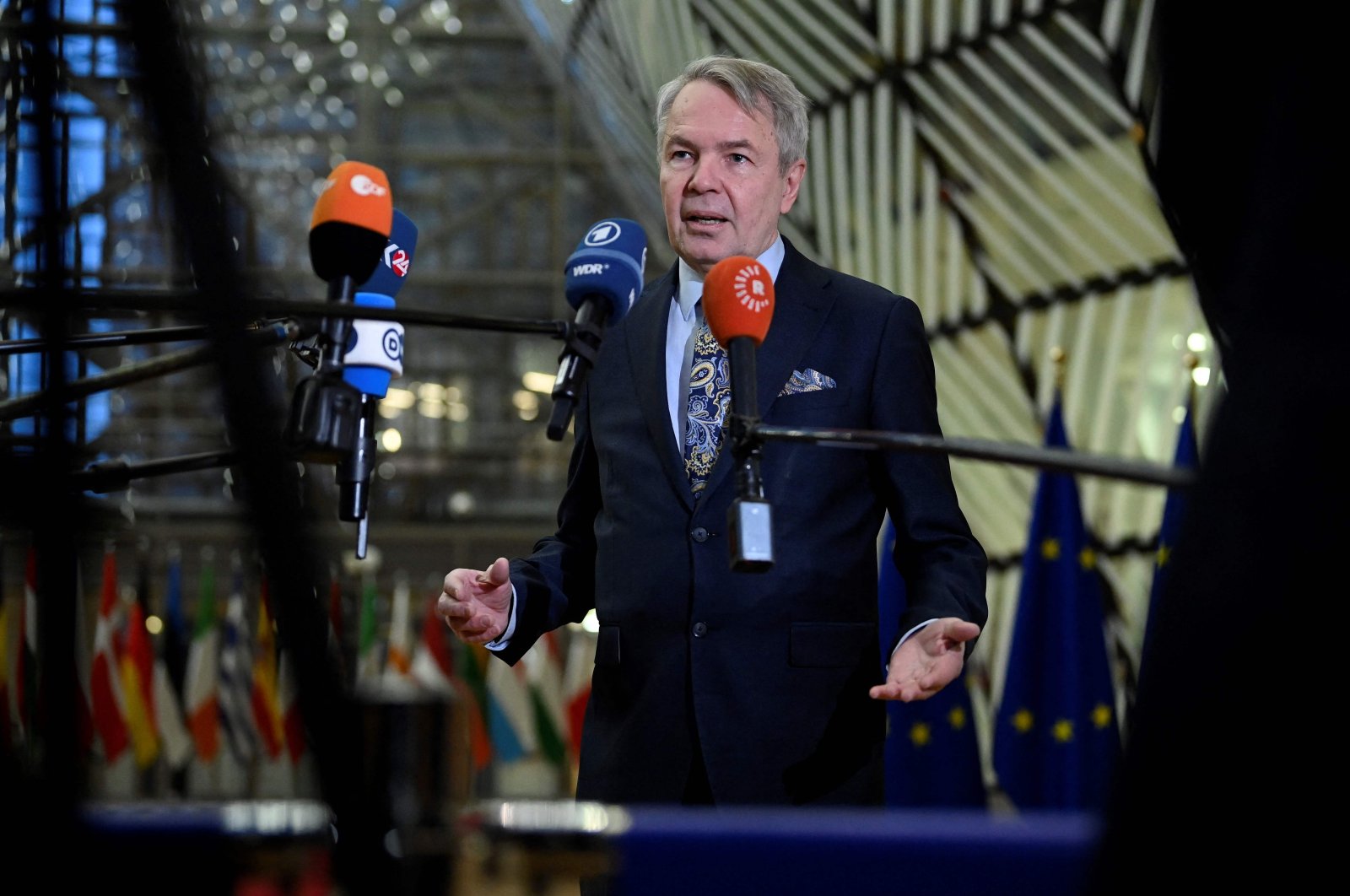 Finnish Foreign Minister Pekka Haavisto talks to the press during an EU foreign ministers meeting in Brussels, Belgium, Jan. 23, 2023. (AFP Photo)
