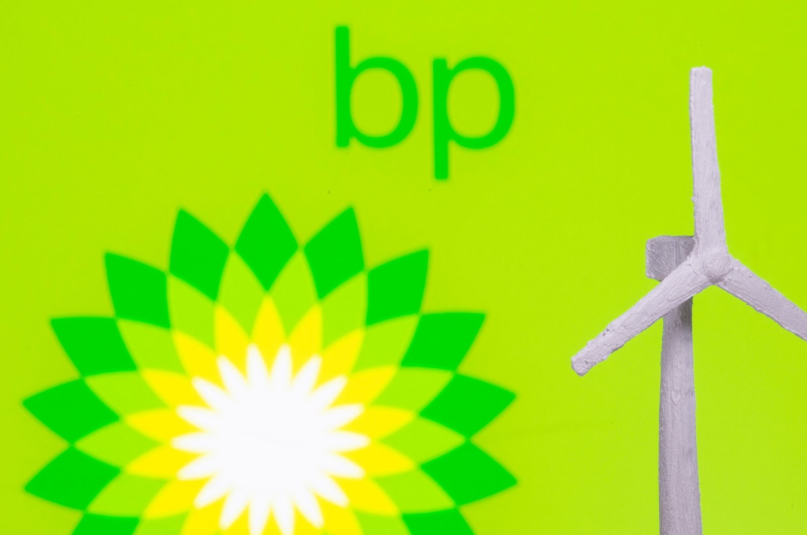 A windmill is seen in front of the BP logo in this illustration picture, Aug. 11, 2021. (Reuters File Photo)