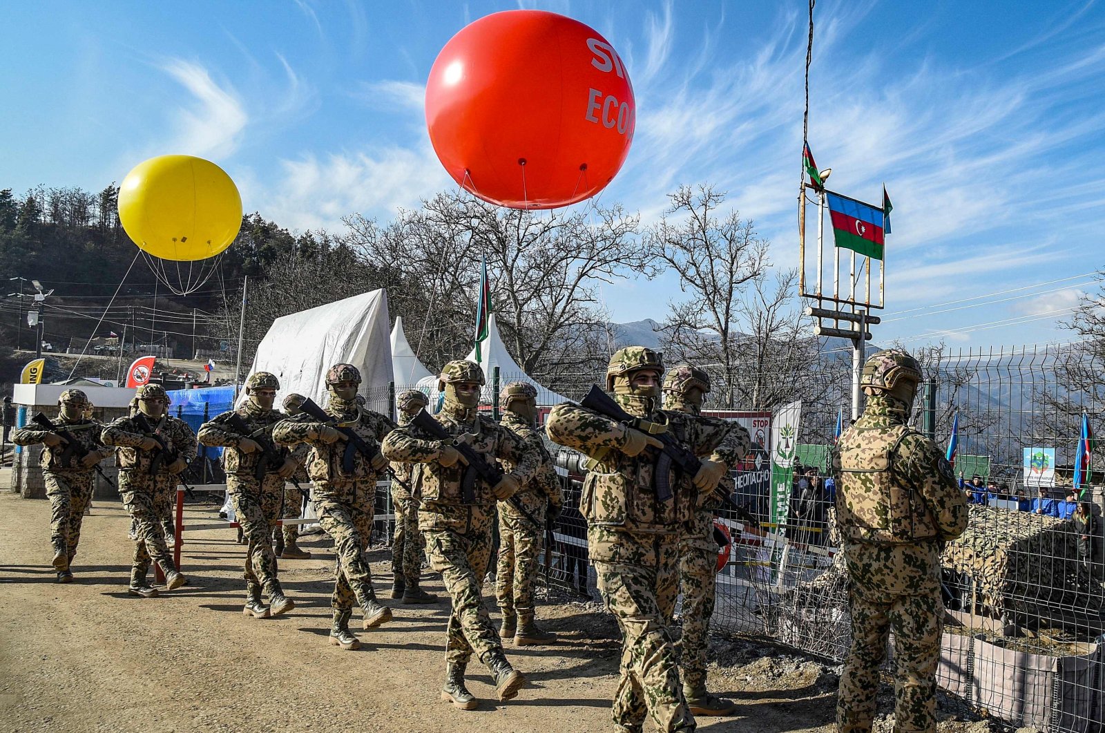Azerbaijani soldiers march at a checkpoint at the Lachin corridor, Karabakh, Azerbaijan, Dec. 27, 2022. (AFP Photo)