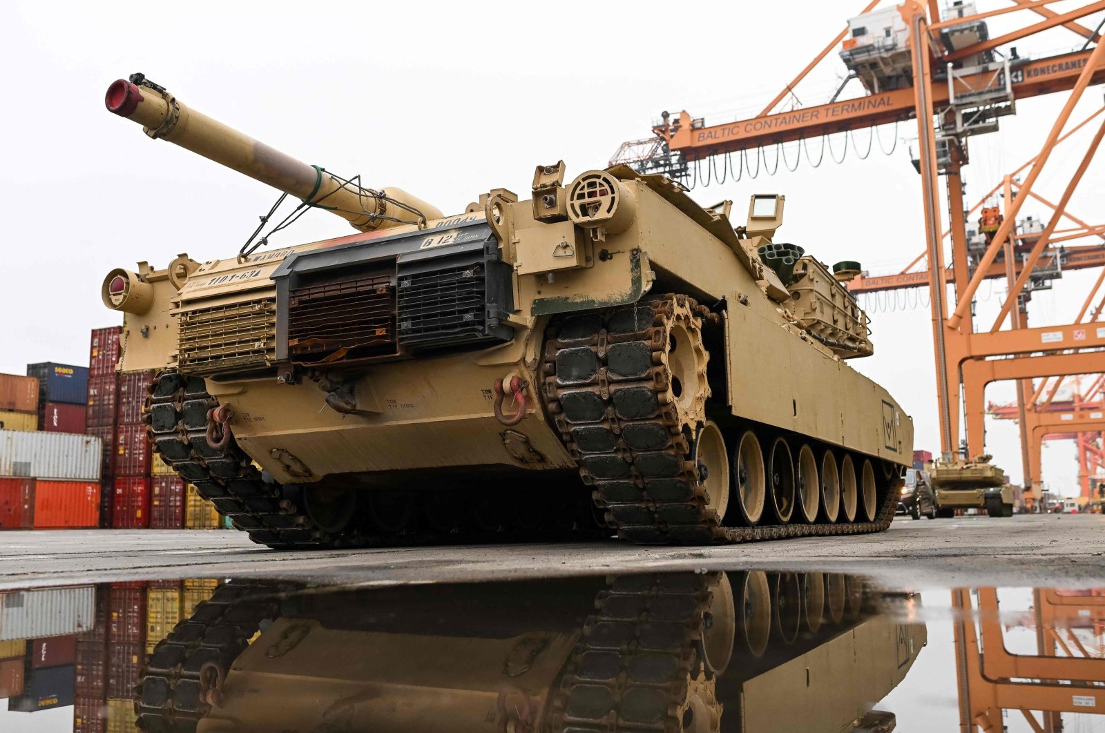 An M1A2 Abrams battle tank of the U.S. army that will be used for military exercises by the 2nd Armored Brigade Combat Team, is pictured at the Baltic Container Terminal in Gdynia, Dec. 3, 2022. (AFP File Photo)