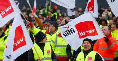 Demonstrators protest during a general strike by employees over pay demands, at the Berlin Brandenburg Airport (BER), in Schoenefeld near Berlin, Germany, Jan. 25, 2023. (Reuters Photo)