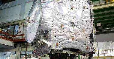Engineers work around the ESA's "Juice" probe during its unveiling for media in Toulouse, France, Jan. 20, 2023. (AFP Photo)