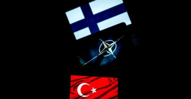 Photographic compositions depicting the flags of Finland, Türkiye and NATO displayed on the screens of personal computers and smartphones in Rome, Italy, May 14, 2022. (Reuters File Photo)