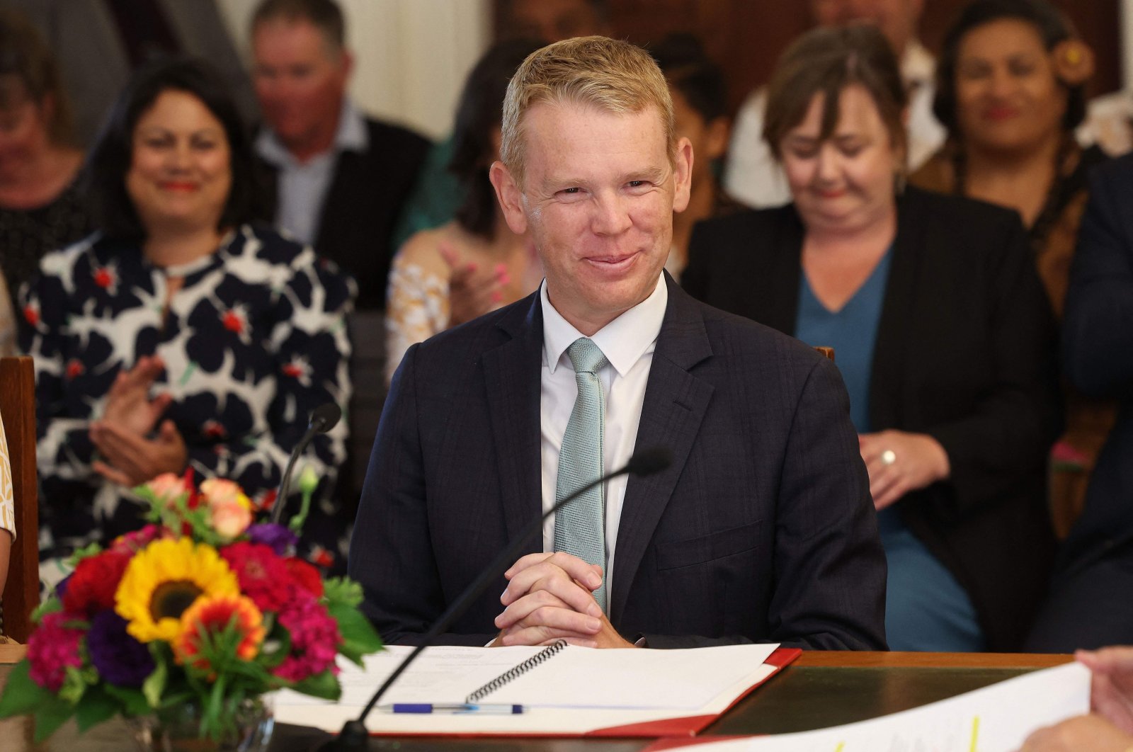 New Zealand&#039;s new Prime Minister Chris Hipkins smiles as he is sworn in by Governor General Dame Cindy Kirom, Wellington, New Zealand, Jan. 25, 2023. (AFP Photo)