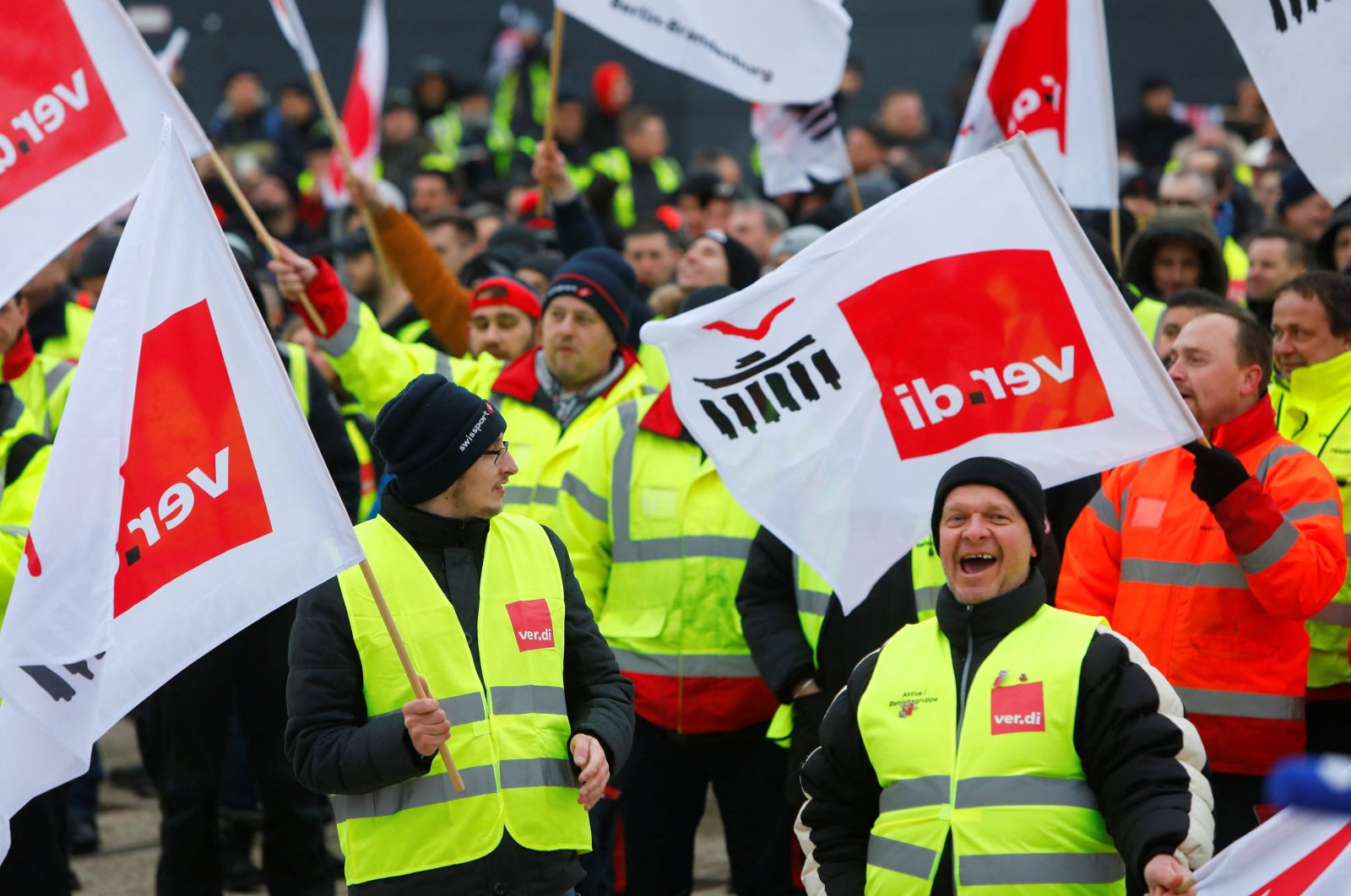Demonstrators protest during a general strike by employees over pay demands, at the Berlin Brandenburg Airport (BER), in Schoenefeld near Berlin, Germany, Jan. 25, 2023. (Reuters Photo)
