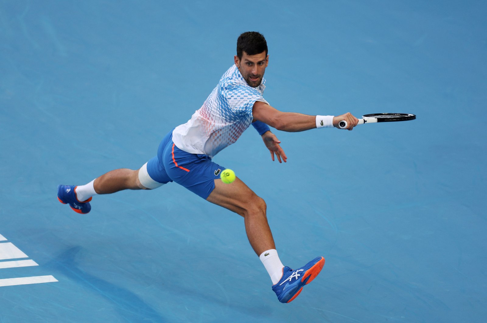 Serbia’s Novak Djokovic in action during his Australian Open quarterfinal match against Russia’s Andrey Rublev at Melbourne Park, Melbourne, Australia, Jan. 25, 2023. (Reuters Photo)