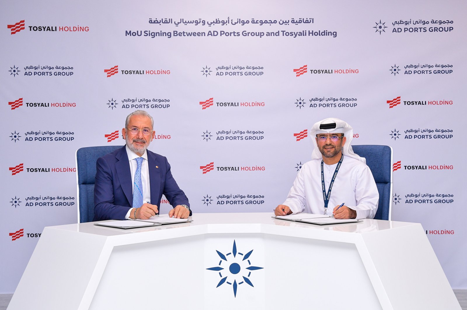 Fuat Tosyalı (L), chairperson of the Board of Directors of Tosyalı Holding, and Mohamed Juma Al Shamisi (R), managing director and CEO of AD Ports Group, pose for a photo during a signing ceremony of a Memorandum of Understanding, in Abu Dhabi, United Arab Emirates (UAE), Jan. 25, 2023. (Courtesy of Tosyalı Holding)