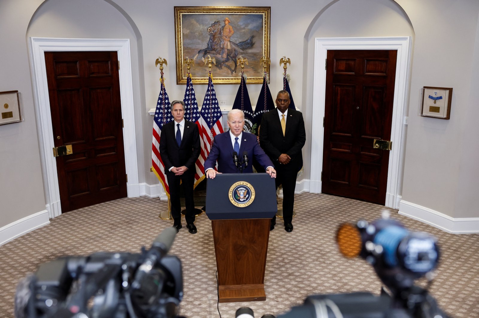 U.S. President Joe Biden is flanked by Secretary of State Antony Blinken and Defense Secretary Lloyd Austin as he delivers remarks on &quot;continued support for Ukraine,&quot; in the Roosevelt Room at the White House in Washington, U.S., Jan. 25, 2023. (Reuters Photo)